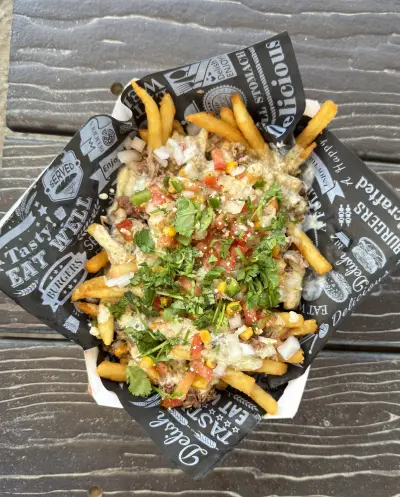 Brisket Elote Queso Fries